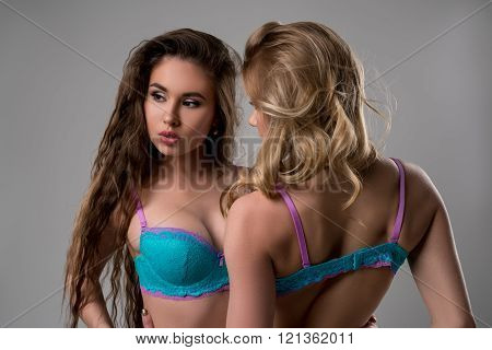 Advertising lingerie. Sexy models posing in studio