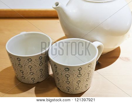 Beverage and Drink Closeup of Tea Cups with Tea Pot Used for Drinking Green Tea. Selective Focus.
** Note: Soft Focus at 100%, best at smaller sizes