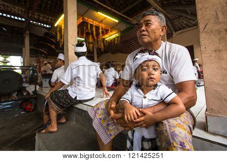 UBUD, BALI - MAR 8, 2016: Unidentified child during the celebration before Nyepi - Balinese Day of Silence. Day Nyepi is also celebrated as New Year - according Balinese calendar now came 1938 year. 