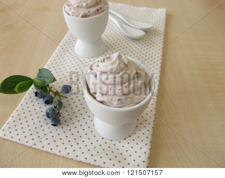 Blueberry ice cream in egg cup