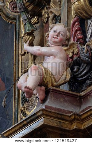 KOTARI, CROATIA - SEPTEMBER 16: Angel on the altar in the church of Saint Leonard of Noblac in Kotari, Croatia on September 16, 2015.