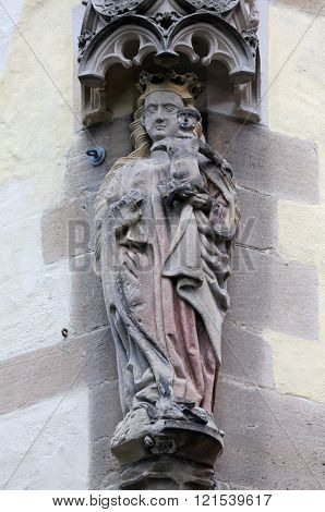 TUBINGEN, GERMANY - OCTOBER 21: Virgin Mary with baby Jesus, Collegiate Church of St. George in Tubingen, Germany on October 21, 2014.