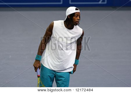 KUALA LUMPUR, MALAYSIA - OCTOBER 2: FranceÃ¢'s Gael Monfils checking a line call in the Malaysian Open Tennis ATP tour. October 2, 2009 in Kuala Lumpur Malaysia.