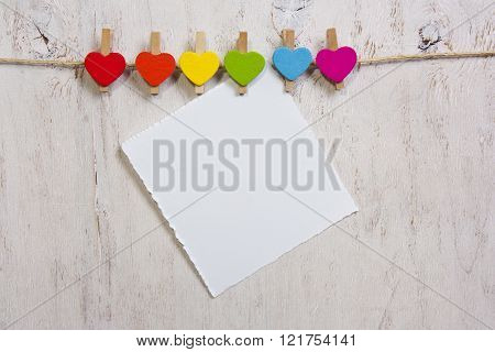 Heart Rainbow Of Colors On A White Wooden Background