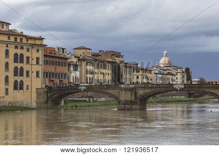 Florence, Italy - March 07: Ponte Santa Trinita Bridge Over The Arno River Shown On March 07, 2016 I