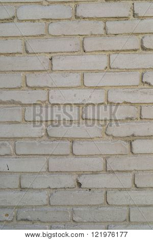 light brick old wall in the cracks for background