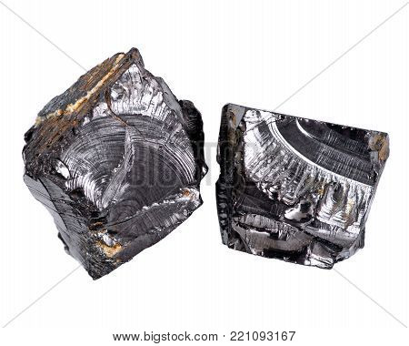 Rough lustrous elite shungite from Russia isolated on white background