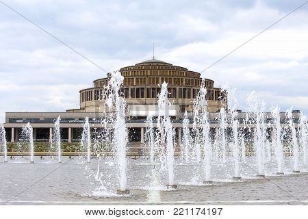 WROCLAW - POLAND, JUNE 13, 2017 : Centennial Hall and Multimedia Fountain. It is sport and entertainment hall built in years 1911-1913, listed as a UNESCO World Heritage Site in 2006