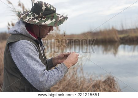 A man enjoys in the free time he spends himself on fishing