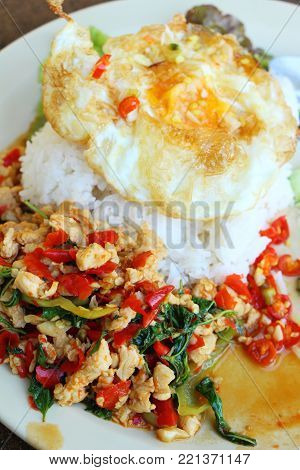 Fried rice with basil chicken and egg fried