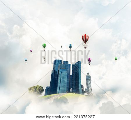 Green flying island among clouds with urban view of towers and skyscrapers. Flying aerostates and blue cloudy skyscape on background. 3D rendering.