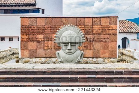 GUATAVITA CUNDINAMARCA, COLOMBIA - DECEMBER 26, 2017: beautiful pre-Columbian statue at the entrance of the town