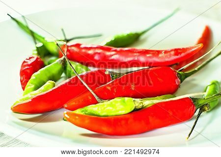Spicy Thai Chilli pappers on a plate.