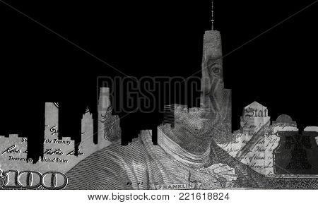 Hundred dollar bill in shape of NYC skyline on black background