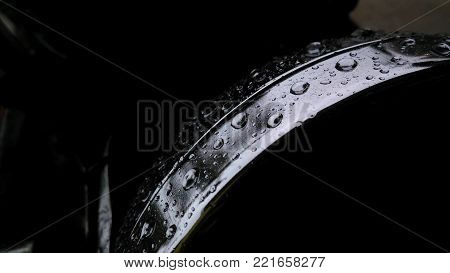 beautiful water drop on the top of metal circle
