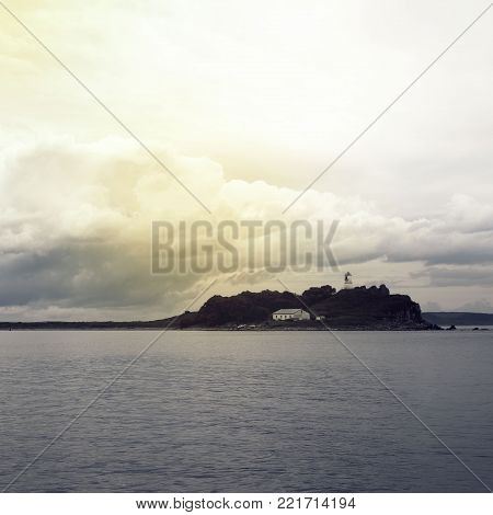 Gloomy seascape line horizon Sea Lighthouse. Natural background. Square