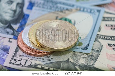 Bitcoins with US banknotes, golden bitcoin, silver bitcoin, bronze bitcoins