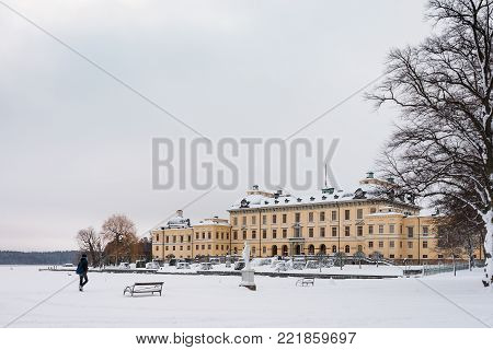 Stockholm, Sweden - January 7, 2017: View Over Lake And Statue In Drottningholm Park On A Winter Day