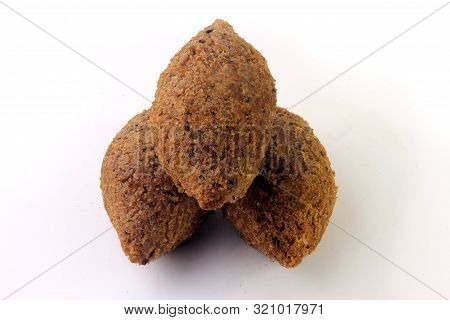 Kibbeh Traditional Lebanese Cuisine Food, Isolated On White Background. Fried Burghul And Meat Balls