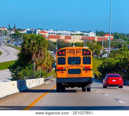 School Bus On The Highway In Miami, Usa