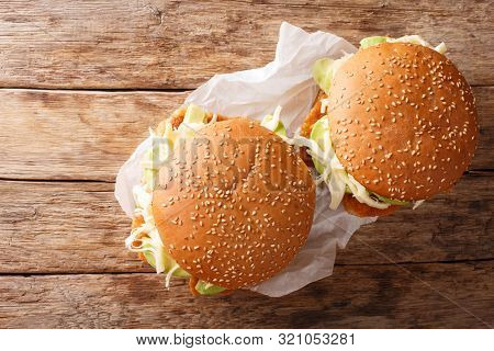 Brioche Cemita Poblana Sandwich With Meat, Cheese And Vegetables Close-up.  Horizontal Top View