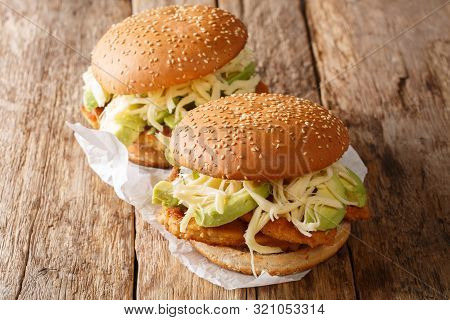 Mexican Traditional Sandwich With Breaded Meat, Cheese And Vegetables Close-up. Horizontal