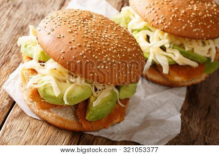 Traditional Mexican Cemita Poblana Sandwich With Meat, Cheese, Avocado And Sauce Close-up. Horizonta