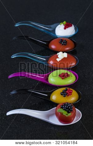 Mini Canapes For Refreshments At Banquets Receptions Catering On A Dark Background.