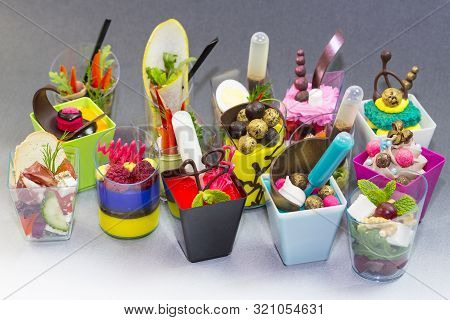 Mini Canapes For Refreshments At Banquets Receptions Catering On A Dark Background.