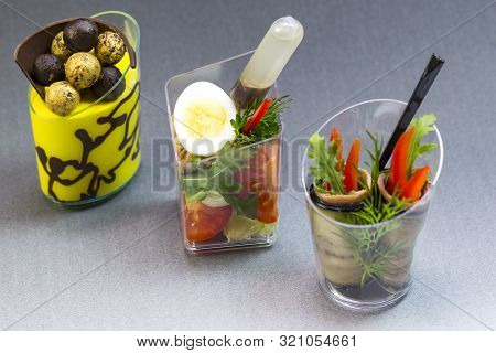 Mini Canapes For Refreshments At Banquets Receptions Catering On A Dark Background.