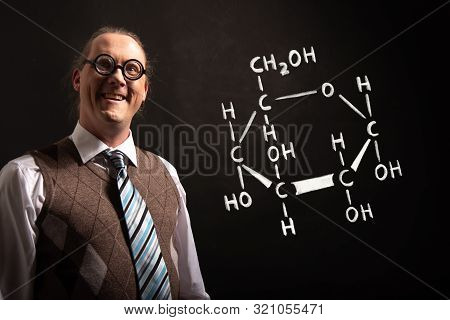 Professor Presenting Handdrawn Chemical Formula Of Glucose