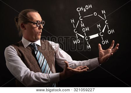 Professor Presenting Handdrawn Chemical Formula Of Glucose