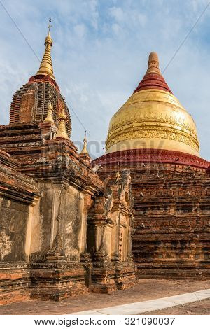 Vertical Picture Of An Ancient Buddhist Dhammayazika Pagoda, Landmark Of Bagan In Myanmar
