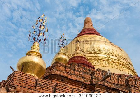 Wide Angle Picture Of The Top Of Ancient Buddhist Dhammayazika Pagoda During Blue Sky Day, Landmark 
