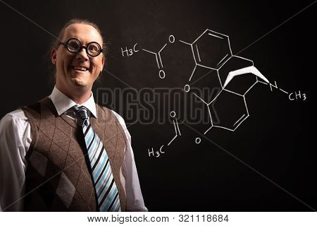 Professor Presenting Handdrawn Chemical Formula Of Heroin