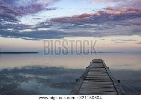 Sunset.panoramic Sky Over Naroch Lake And Pier
