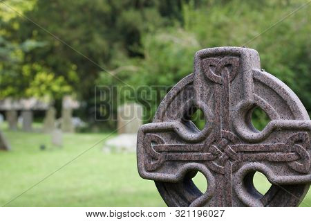 Gravestone In Cemetary With Celtic Knot Design