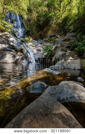 Serra Do Espinhal, Portugal - August 31, 2019 : Waterfall Pedra Ferida, Coimbra, Portugal