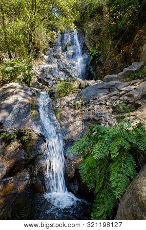 Serra Do Espinhal, Portugal - August 31, 2019 : Waterfall Pedra Ferida, Coimbra, Portugal