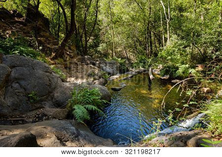 Serra Do Espinhal, Portugal - August 31, 2019 : Waterfall Pedra Ferida, Coimbra, Portugal
