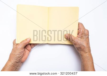 Senior Woman's Hand Holding On Notebook Isolated On White Background, , Stationery Concept