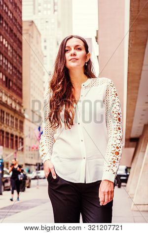 Young Eastern European Woman With Long Black Hair, Traveling In New York, Wearing White, Lace Cut Ou