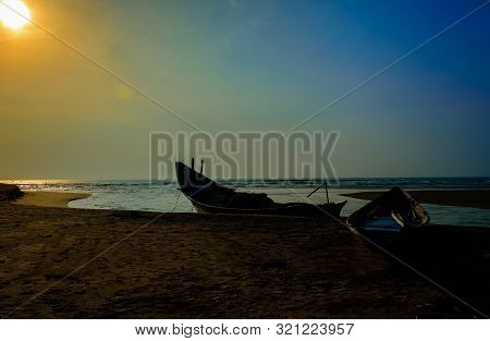 Traditional Colorful Fishing Boat Anchored At The Confluence Of Mahendra Tanaya River And Bay Of Ben