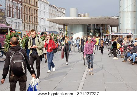 Copenhagen, Denmark - September 4, 2019: People At The Norrebro Railway Station.