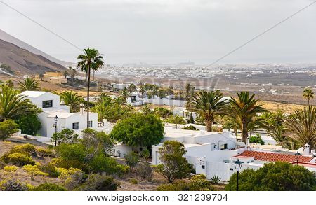 Typical Canarian Village Or Town With White Houses And Volcanic Landscape, Nazaret, Lanzarote Island
