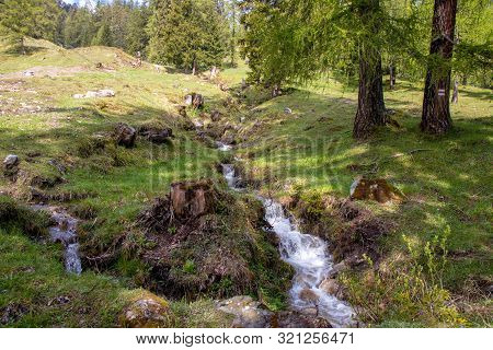 Panorama Of Untouched Landscapes In The Austrian Alps With River, Streams And Waterfalls