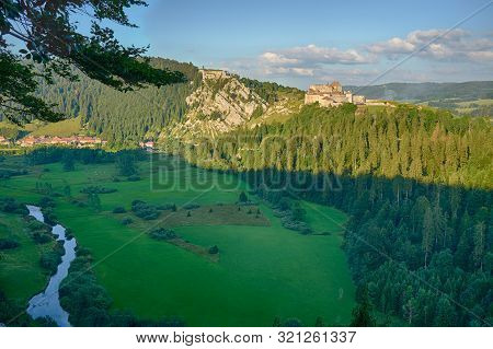 View Of Chateau De Joux, Fort Mahler And The Surrounding Mountains Larmont And Doubs River At Sunset