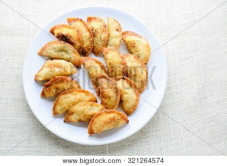 Japanese Fried Dumplings, The Half Moon-shaped Dumplings Served In Asian Restaurants As An Appetiser