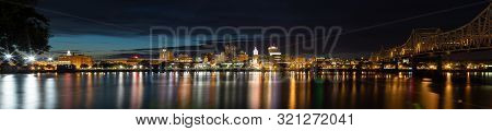Peoria, In The State Of Illinois, United States Of America, At Night, Across The Illinois River