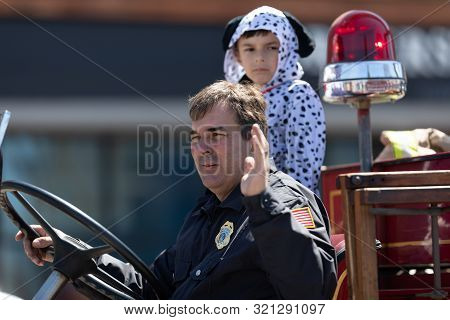 Benton Harbor, Michigan, Usa - May 4, 2019: Blossomtime Festival Grand Floral Parade, Man Driving An